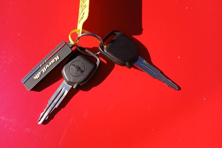 Rød Chevrolet Spark fra 2011