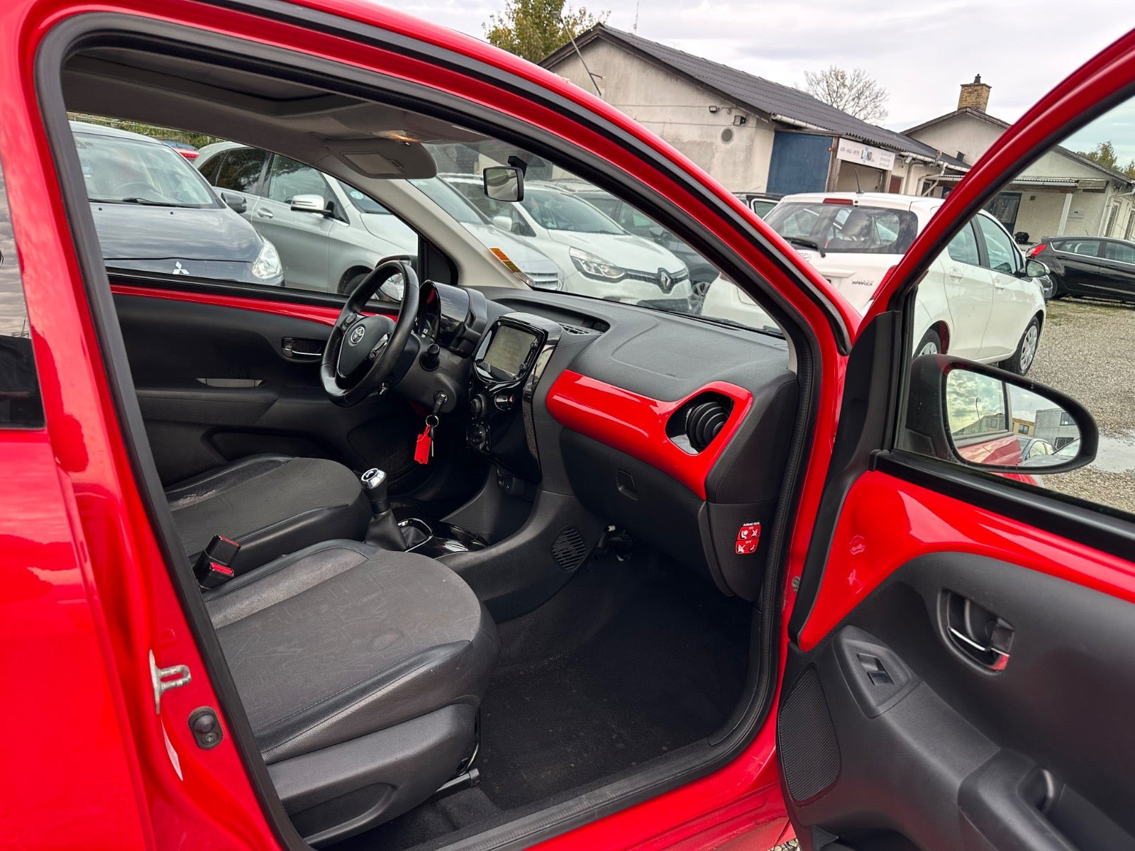 Rød Toyota Aygo fra 2016