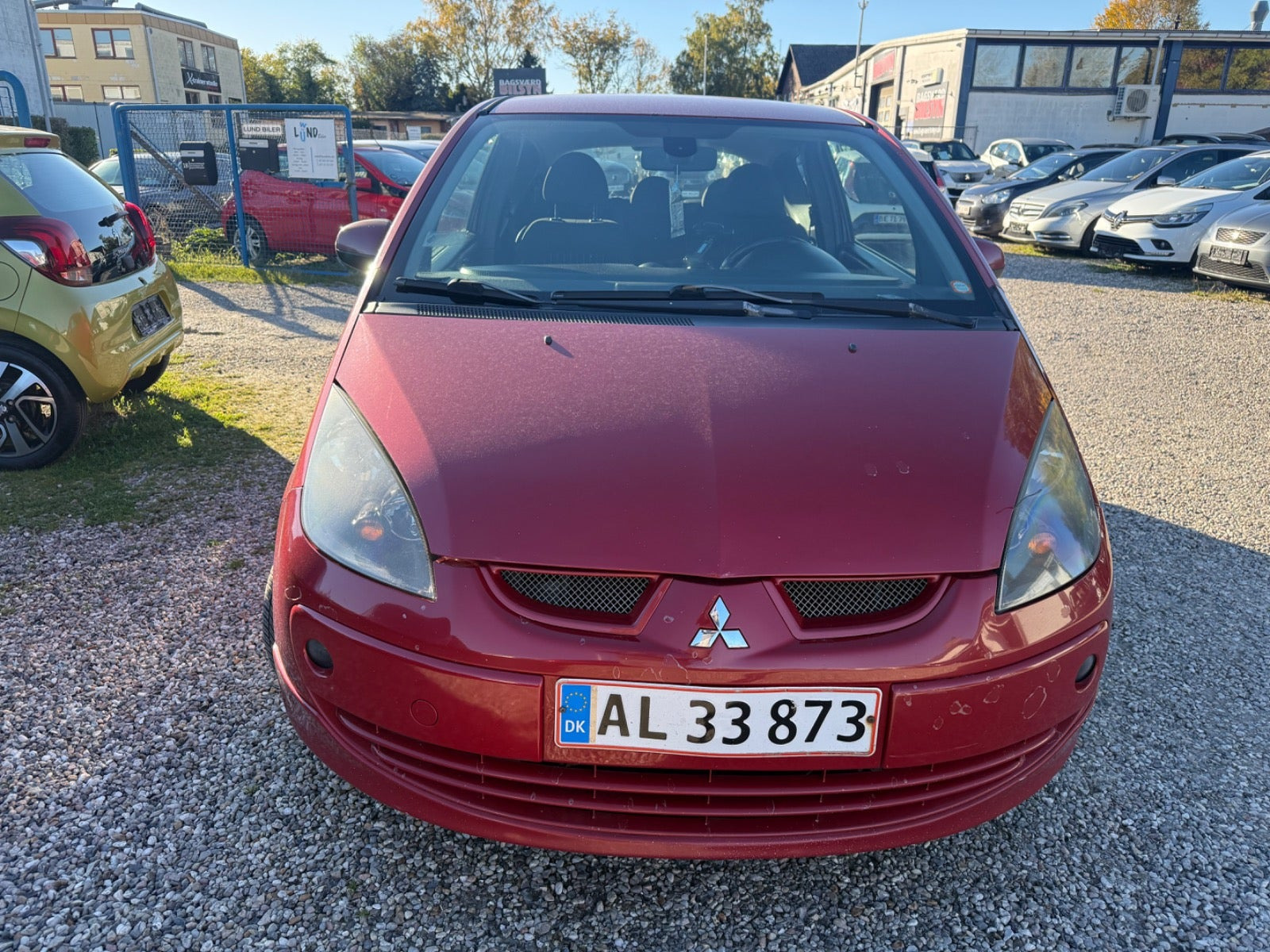 Rød Mitsubishi Colt fra 2008