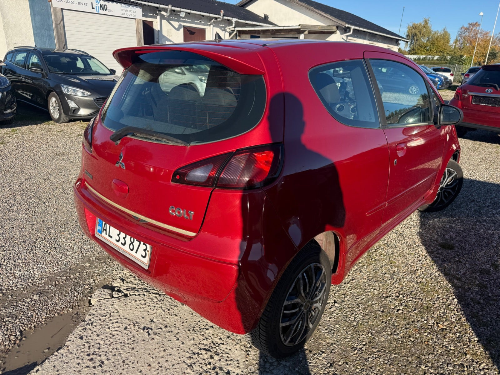 Rød Mitsubishi Colt fra 2008