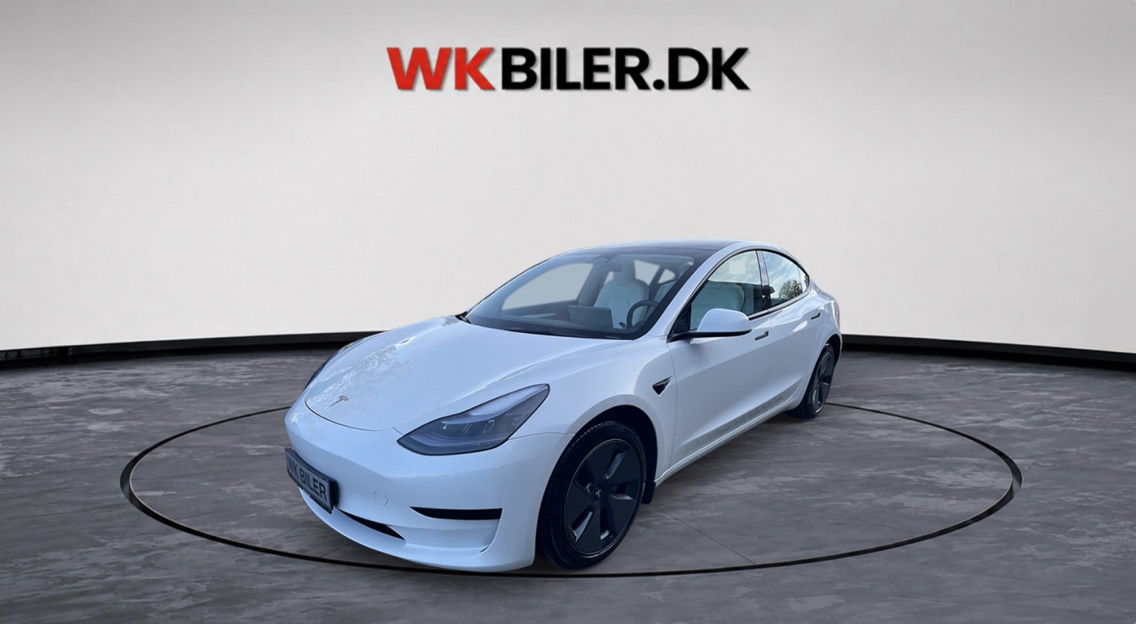Hvid Tesla Model 3 fra 2023