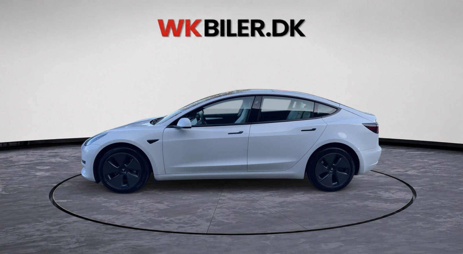 Hvid Tesla Model 3 fra 2023