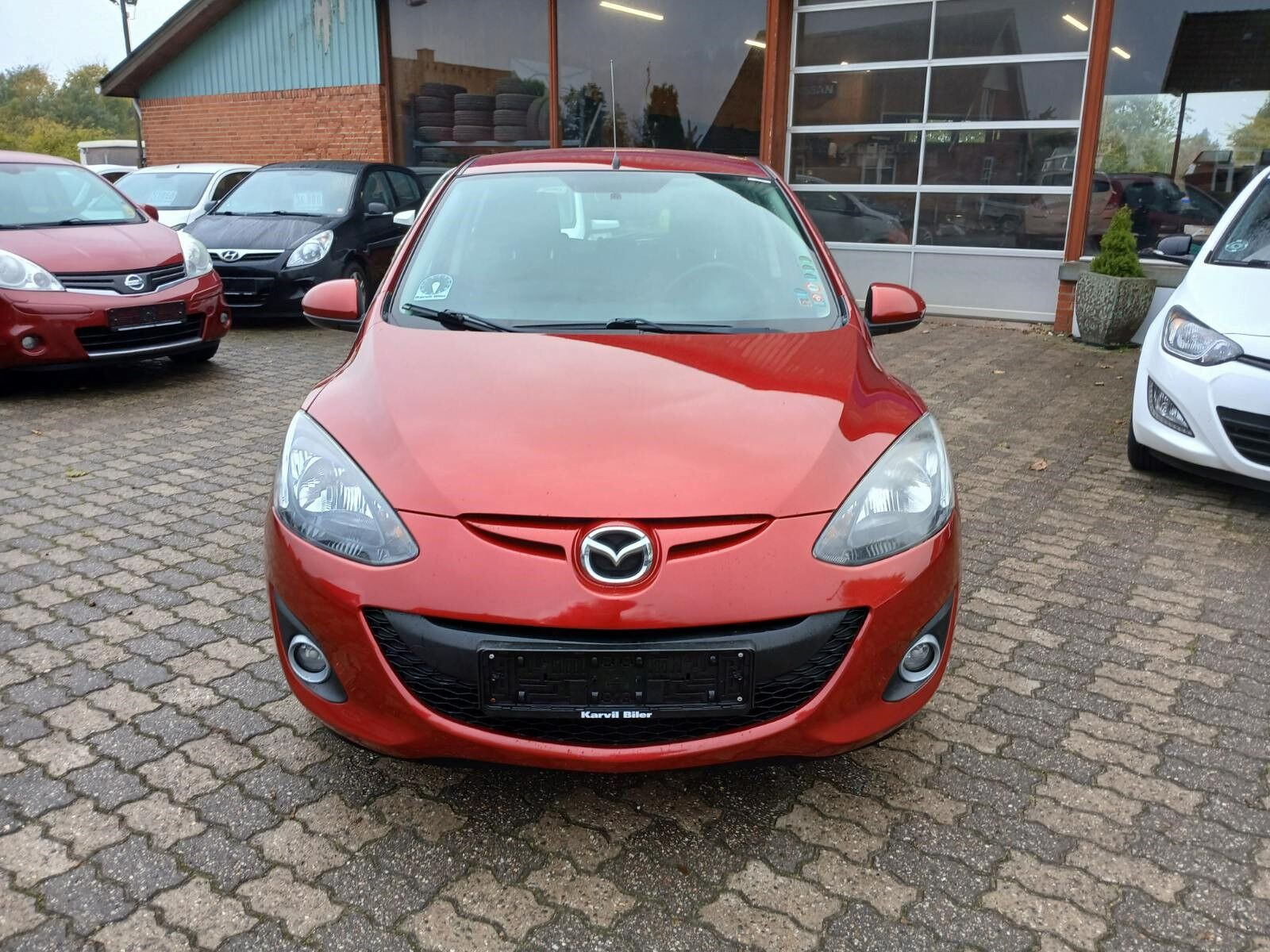 Rød Mazda 2 fra 2014