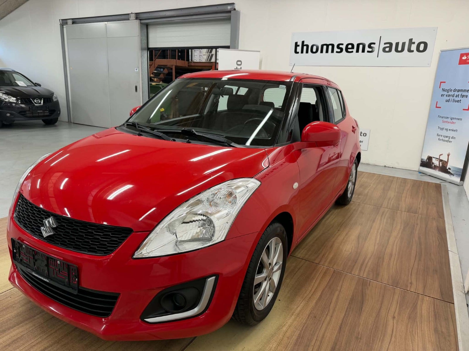 Rød Suzuki Swift fra 2015
