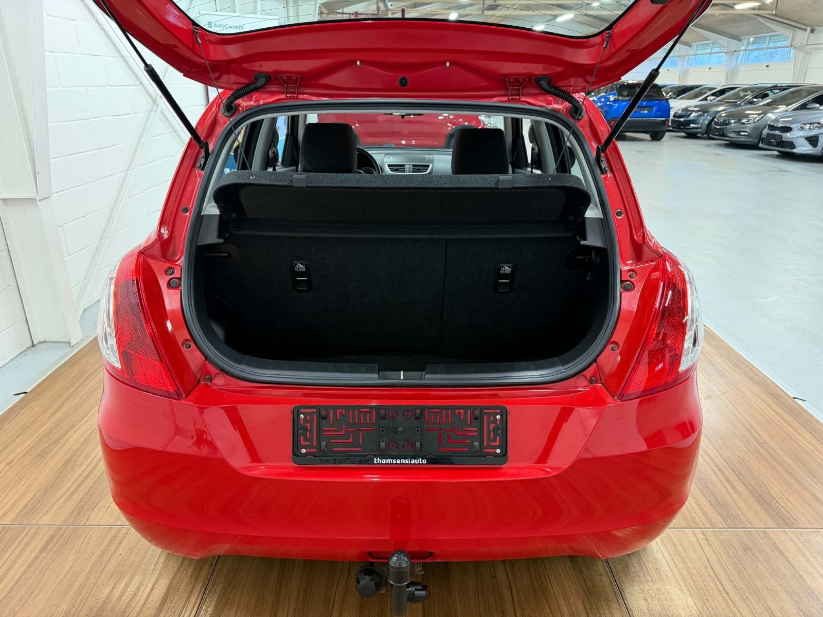 Rød Suzuki Swift fra 2015