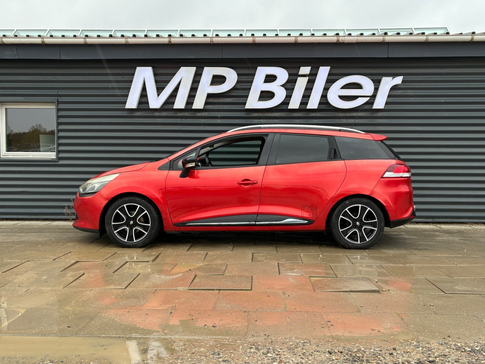 Orange Renault Clio IV fra 2014