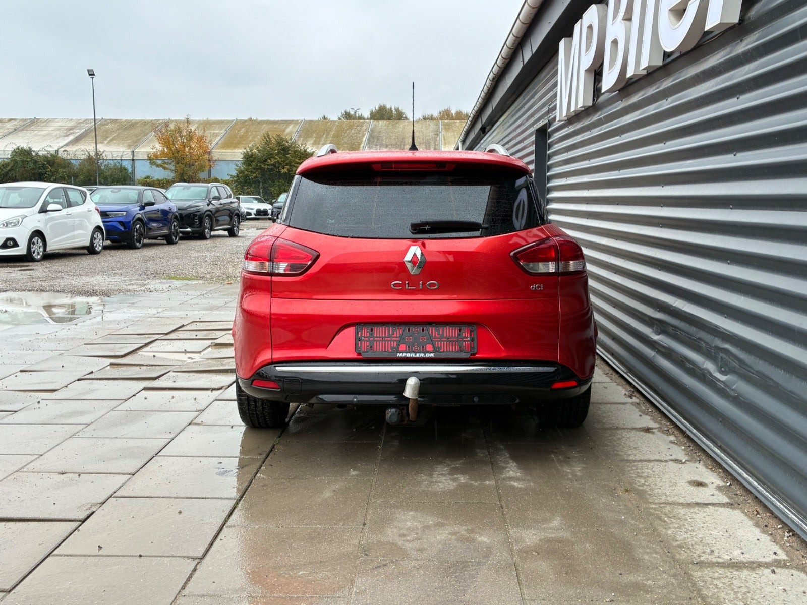 Orange Renault Clio IV fra 2014