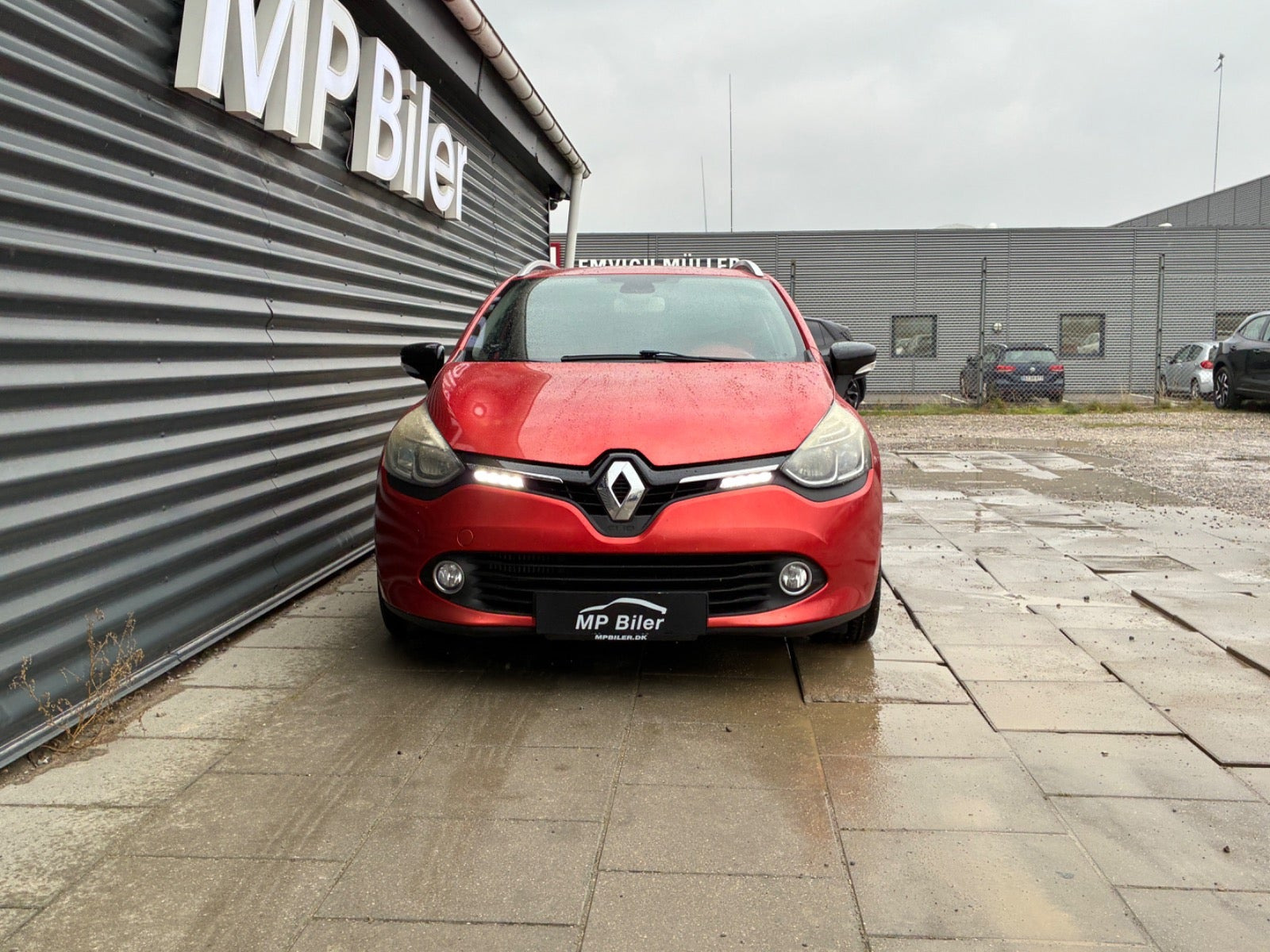 Orange Renault Clio IV fra 2014