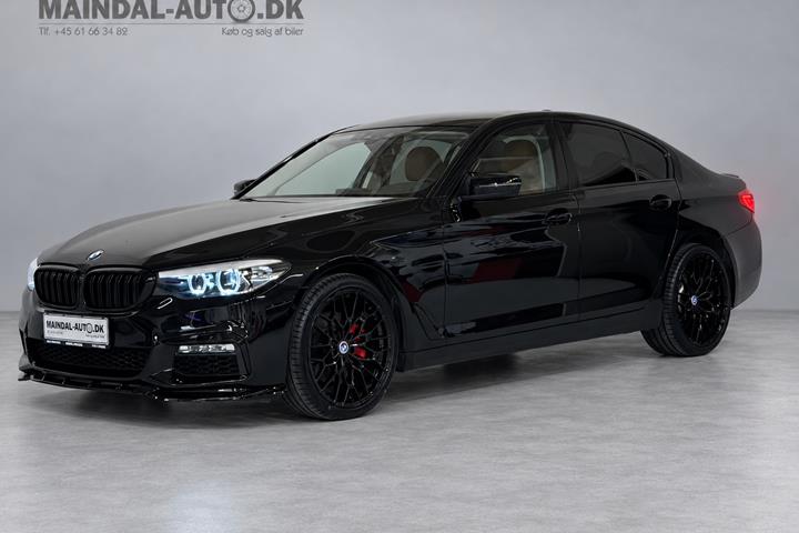 Rød BMW 520d fra 2017