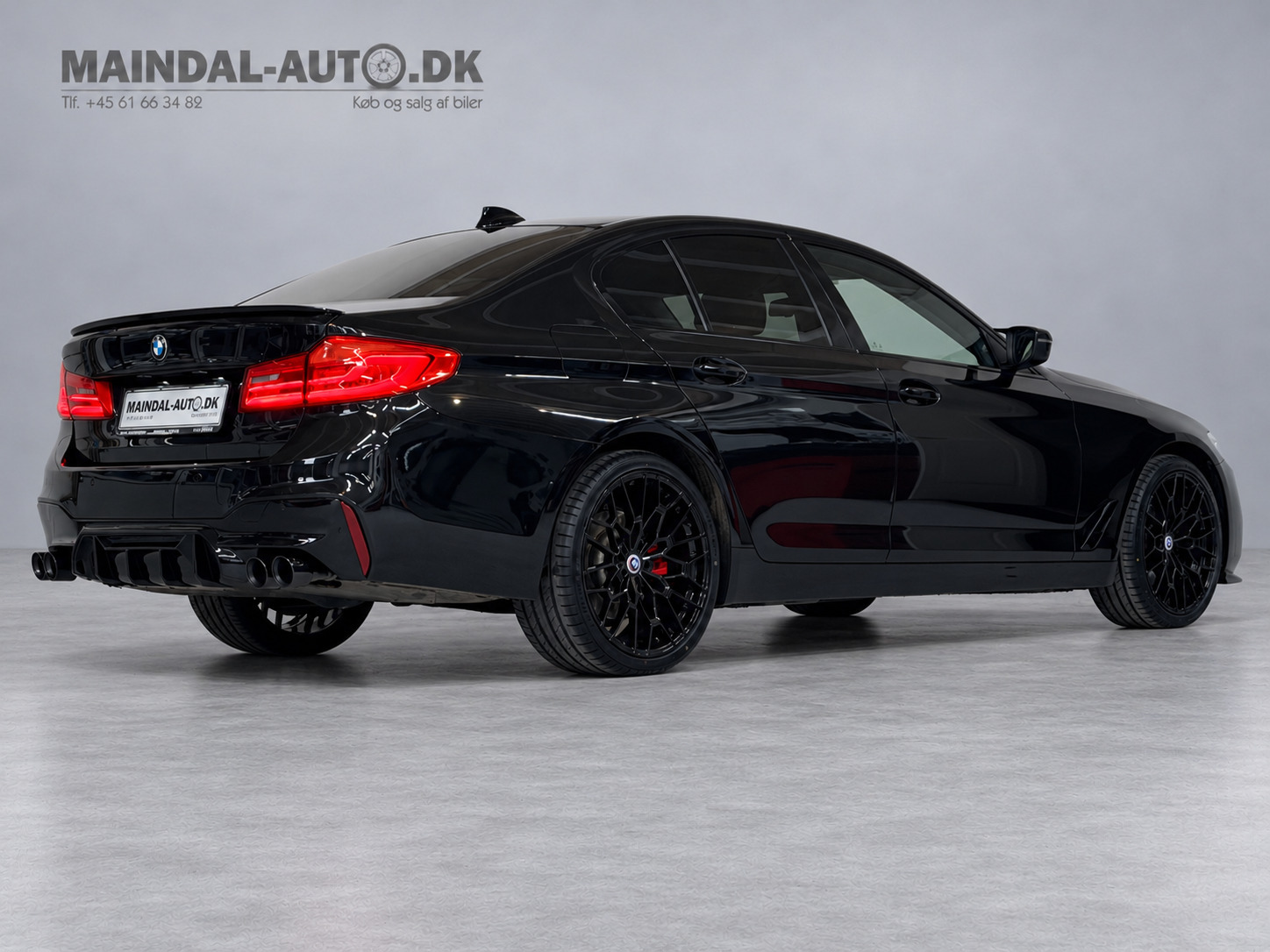 Rød BMW 520d fra 2017