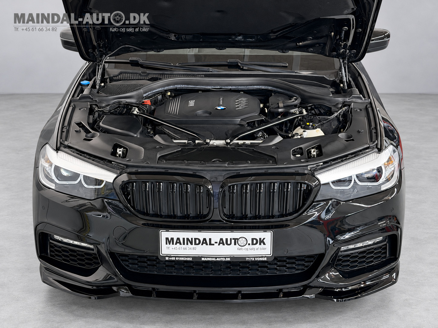 Rød BMW 520d fra 2017
