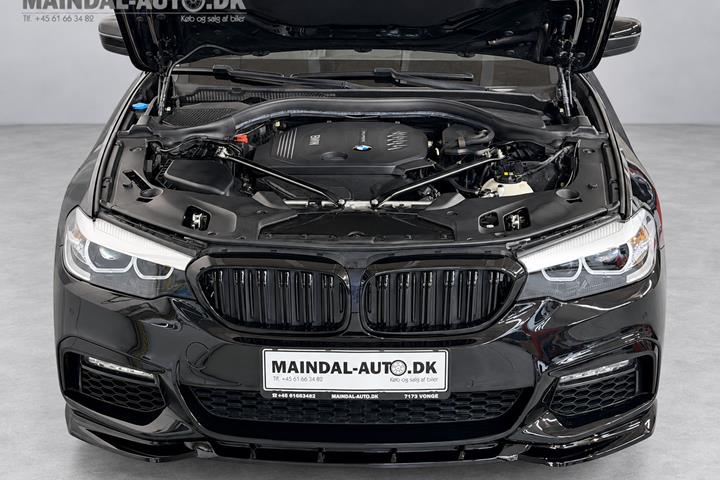 Rød BMW 520d fra 2017