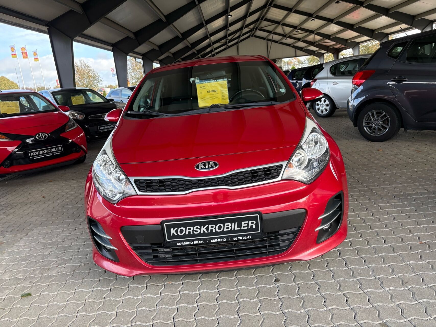 Rød Kia Rio fra 2015