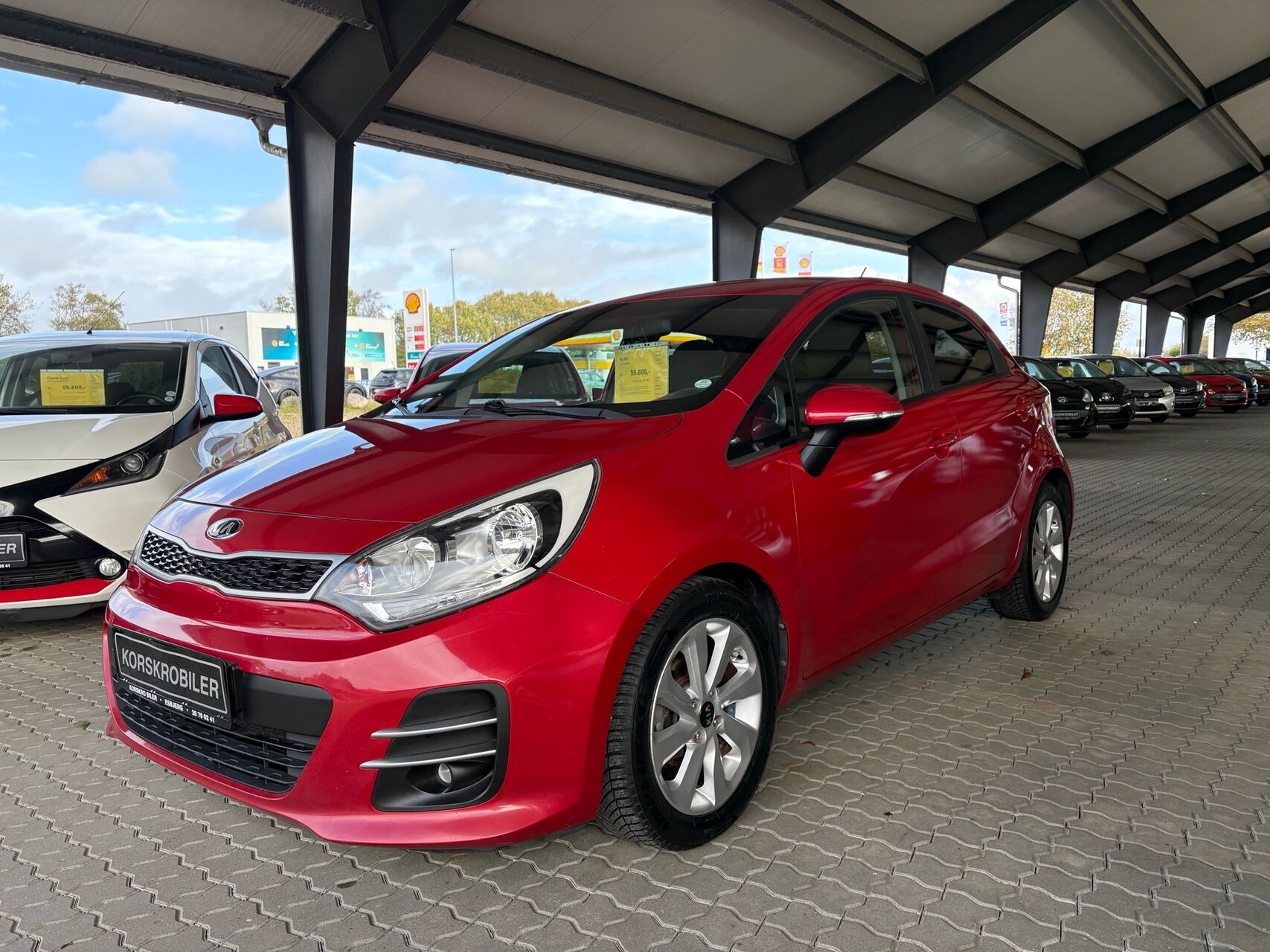 Rød Kia Rio fra 2015