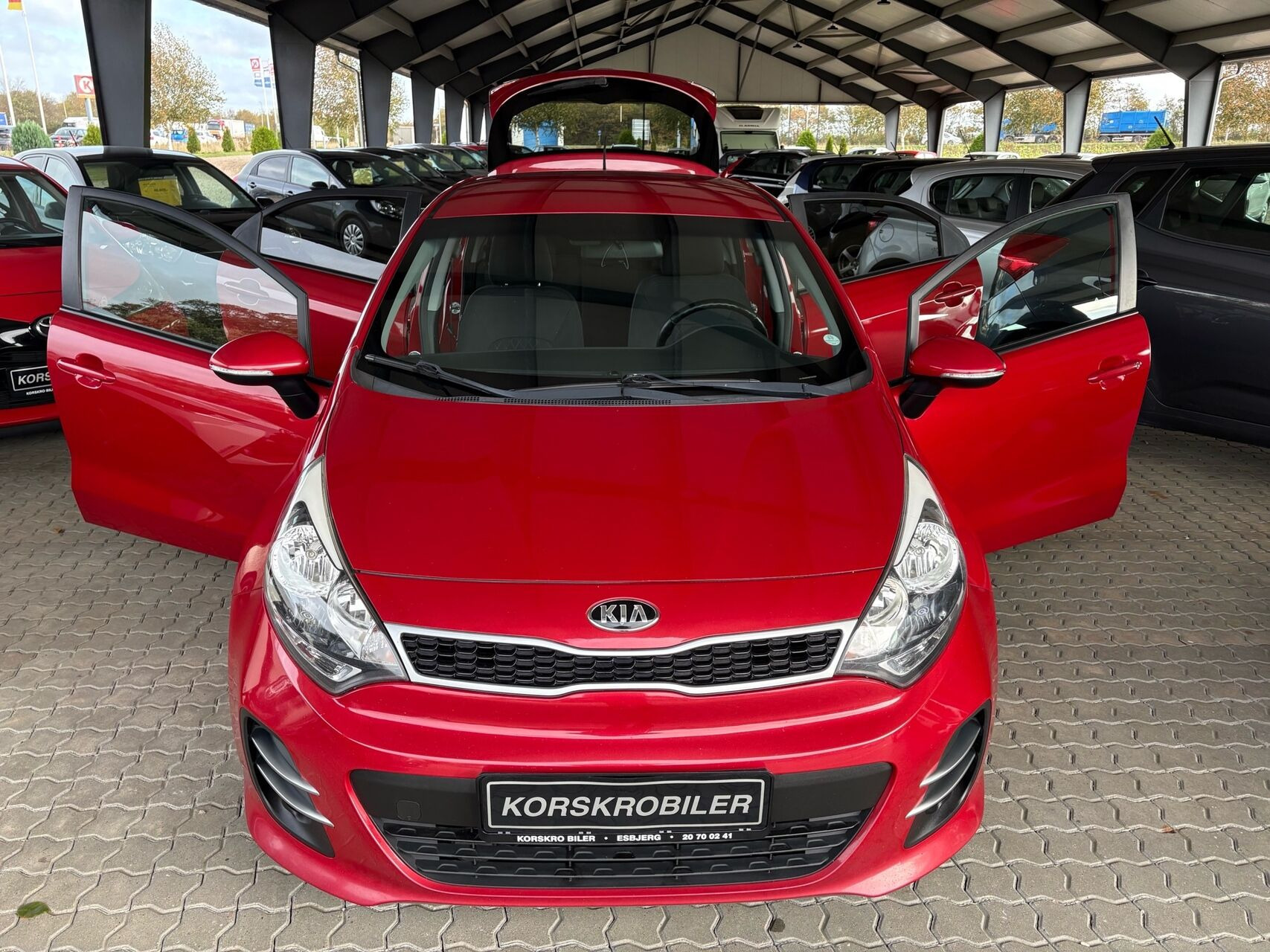 Rød Kia Rio fra 2015