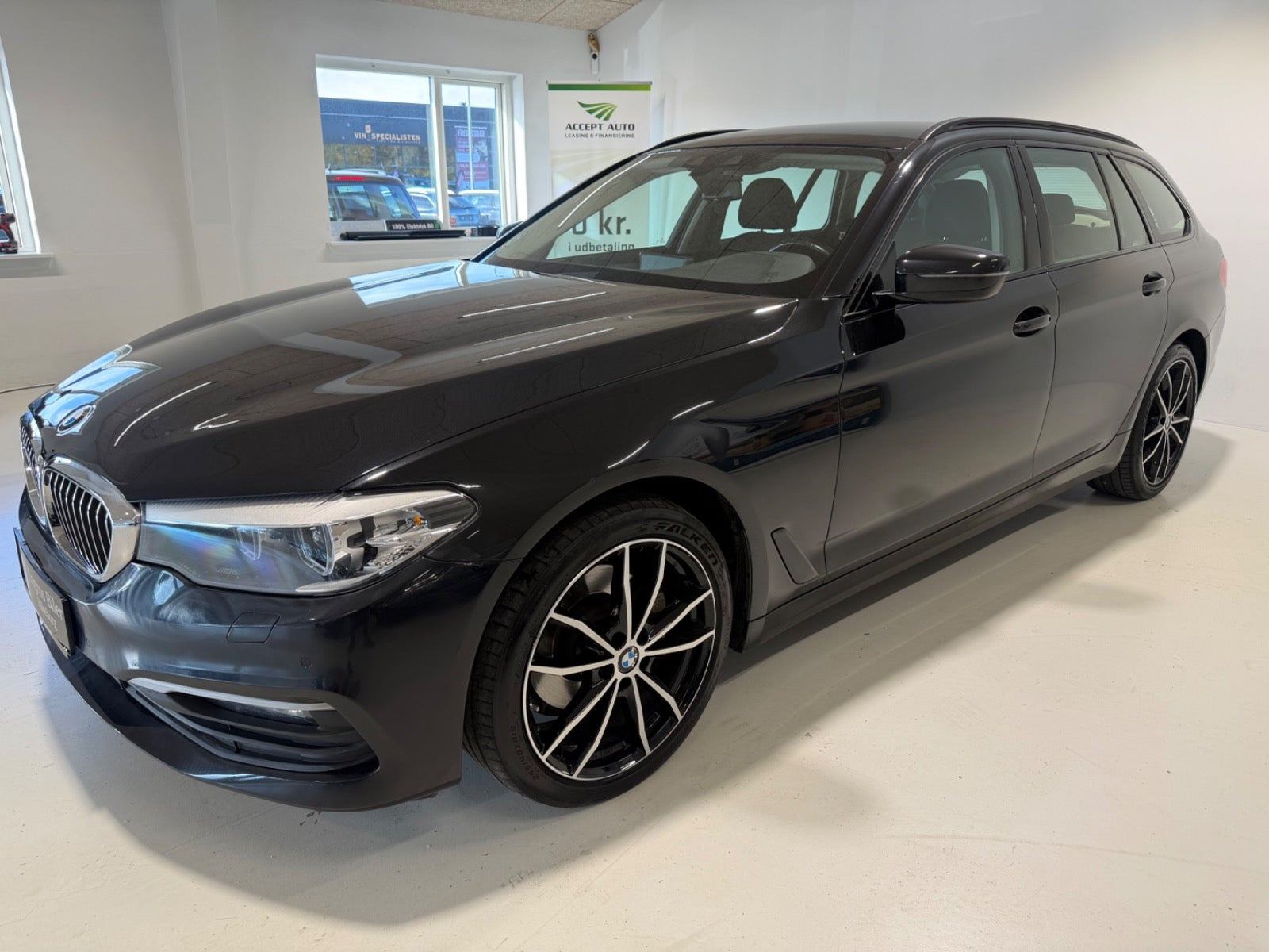 Grå BMW 520d fra 2019