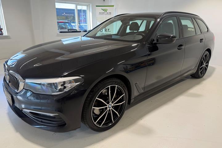 Grå BMW 520d fra 2019