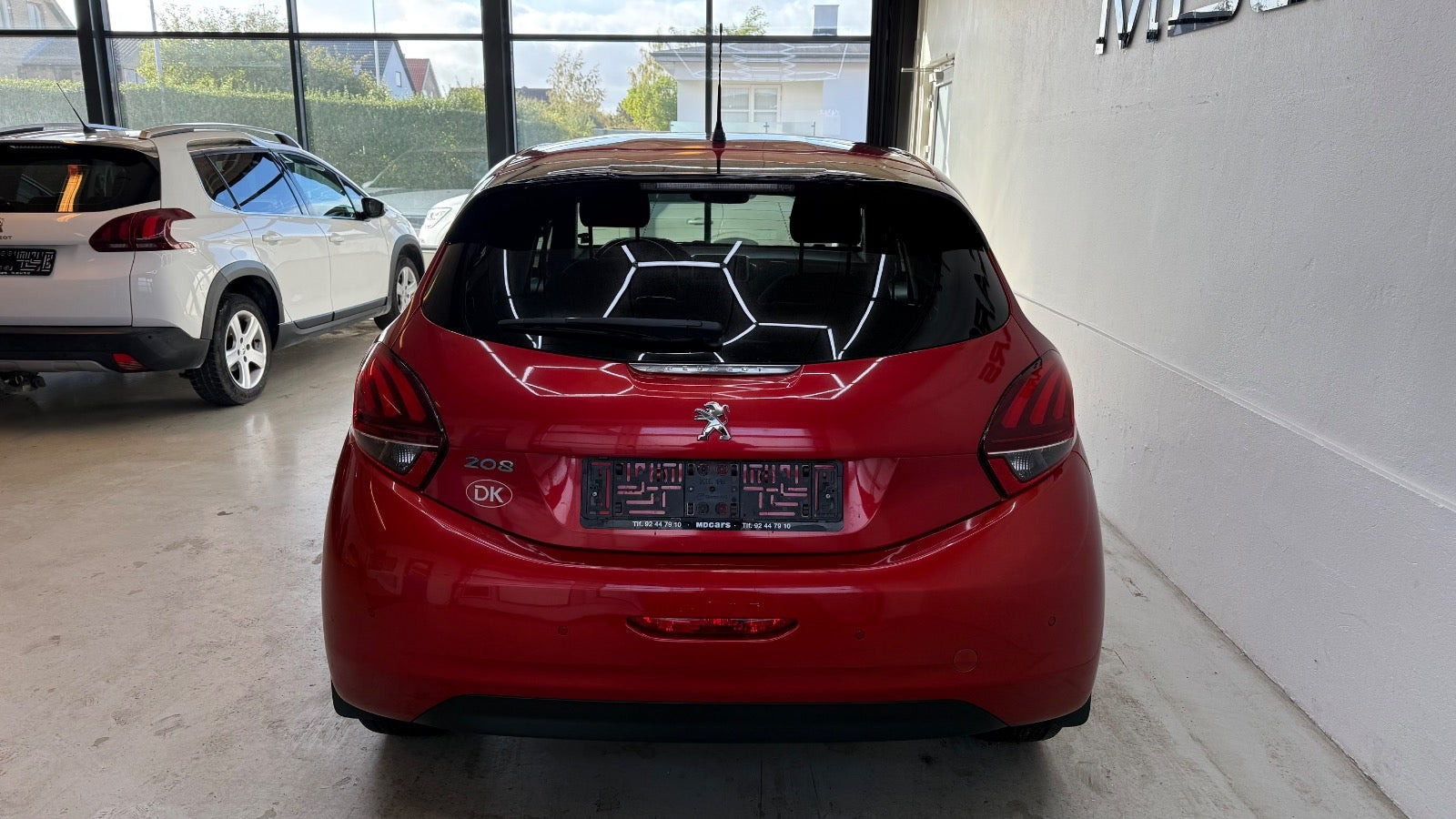 Rød Peugeot 208 fra 2019
