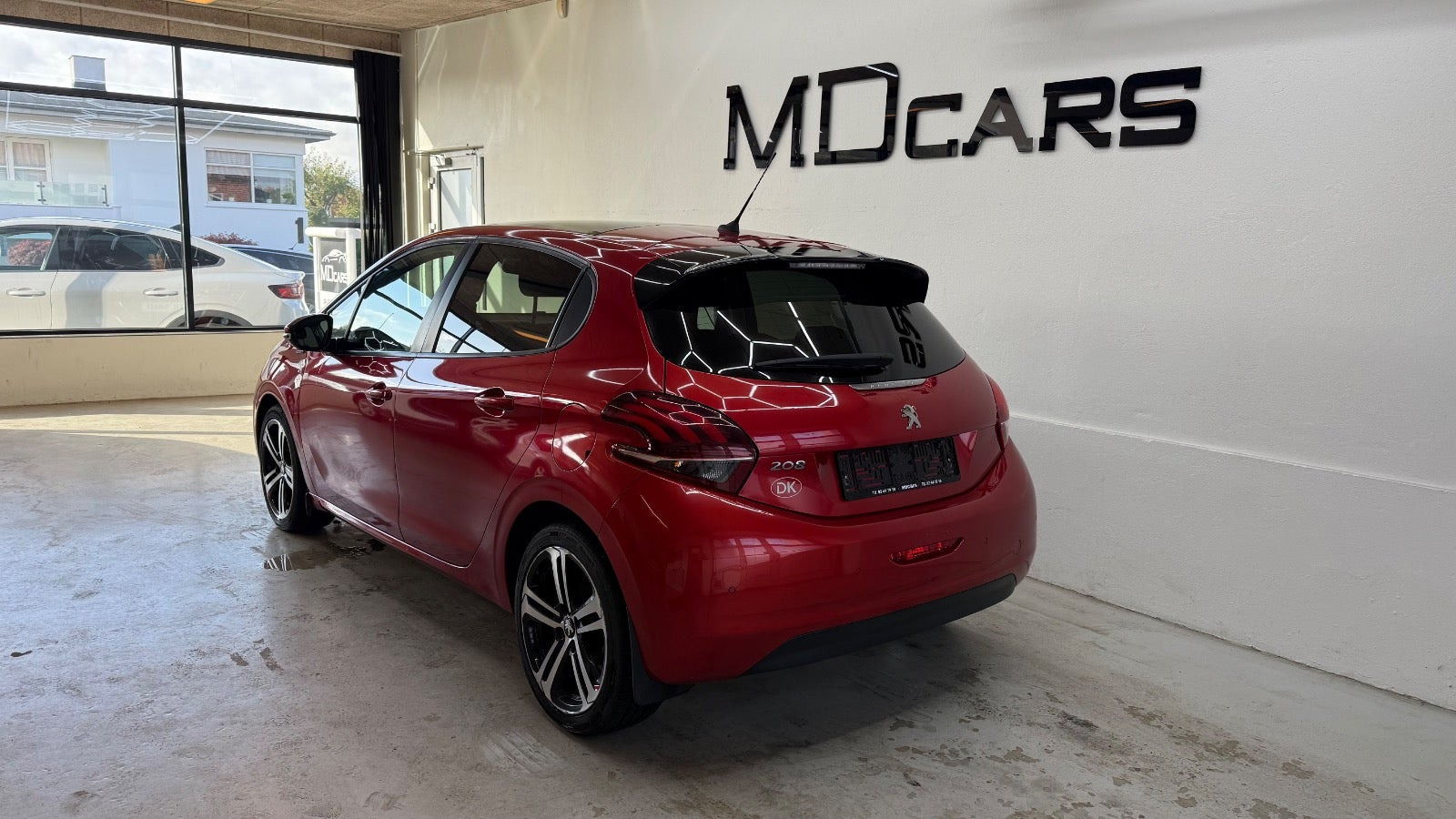 Rød Peugeot 208 fra 2019