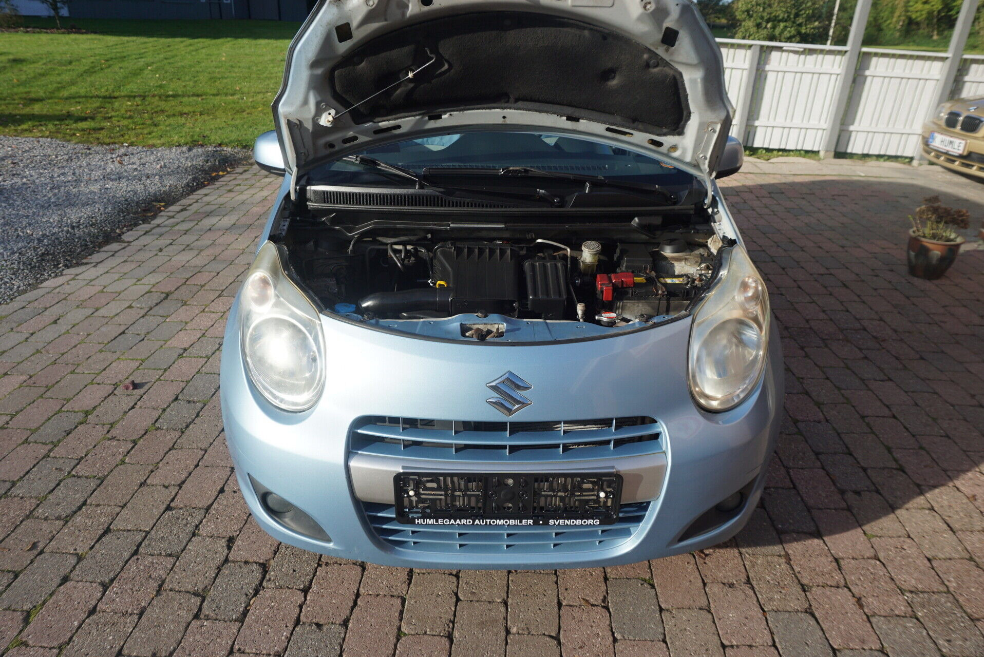 Blå Suzuki Alto fra 2011