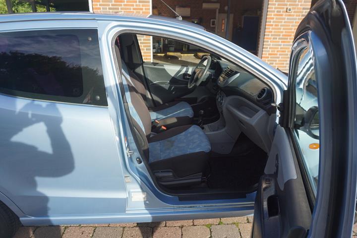 Blå Suzuki Alto fra 2011