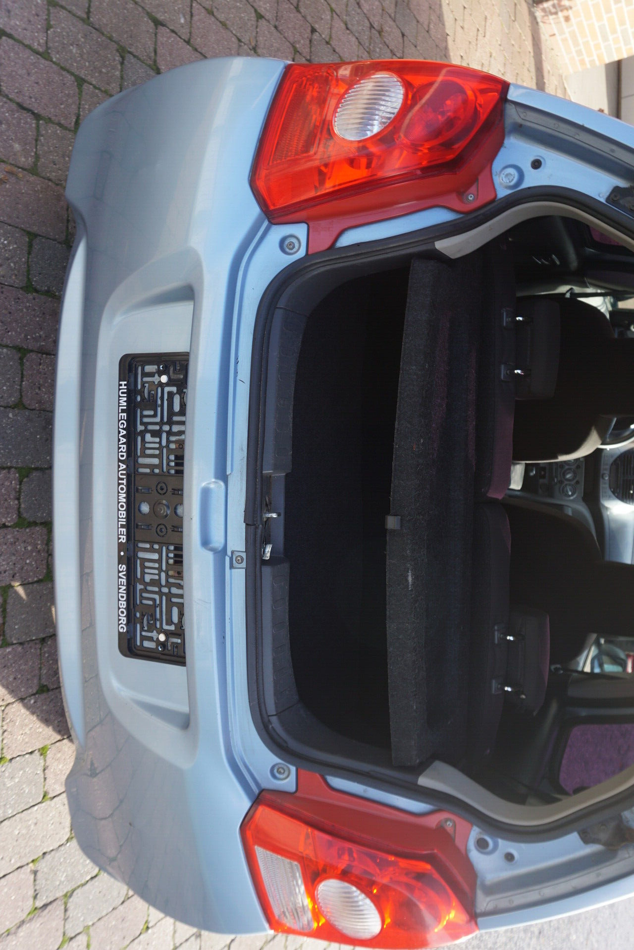 Blå Suzuki Alto fra 2011