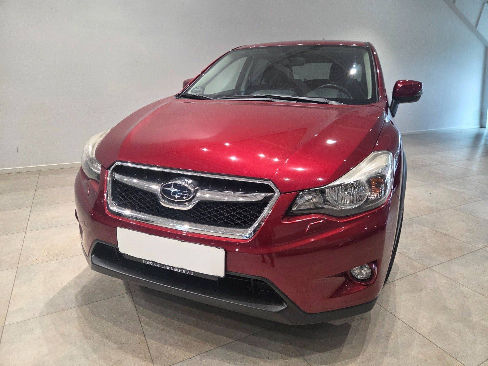 Rød Subaru XV fra 2012