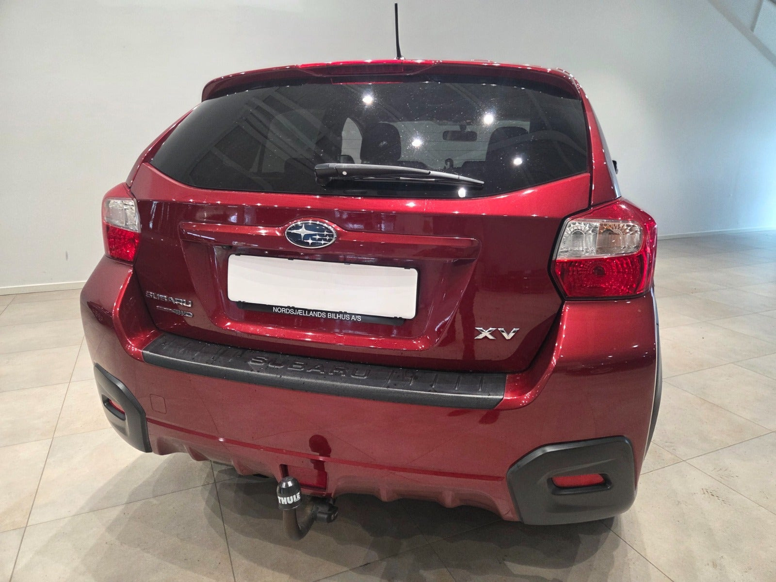 Rød Subaru XV fra 2012