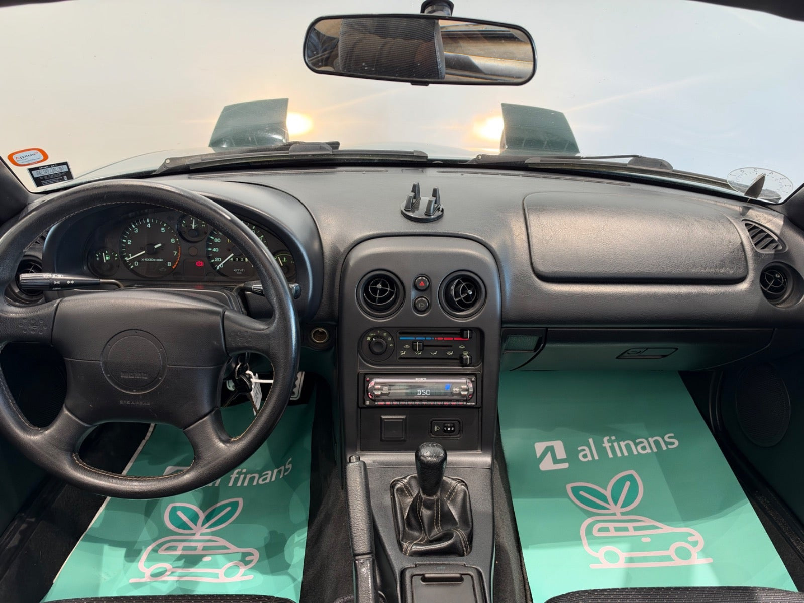 Grøn Mazda MX-5 fra 1997