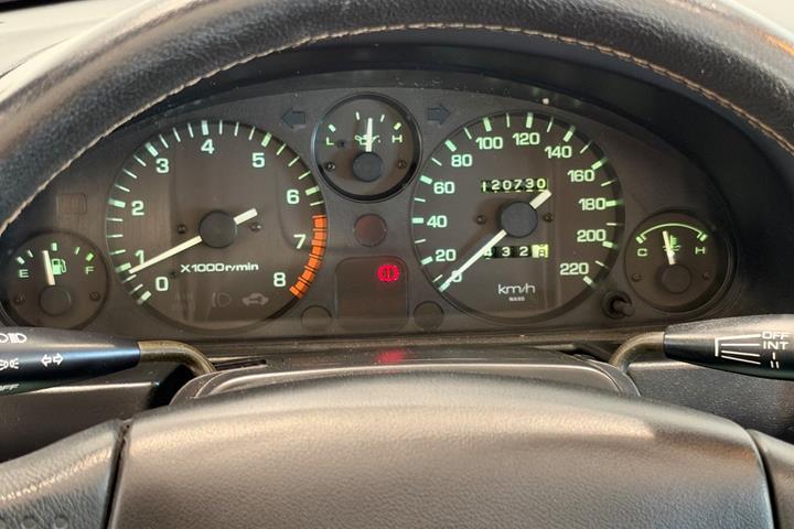 Grøn Mazda MX-5 fra 1997