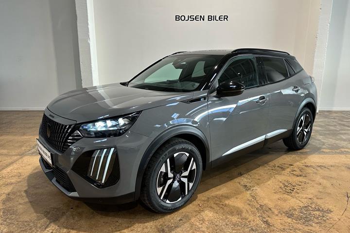 Grå Peugeot e-2008 fra 2024 set udefra