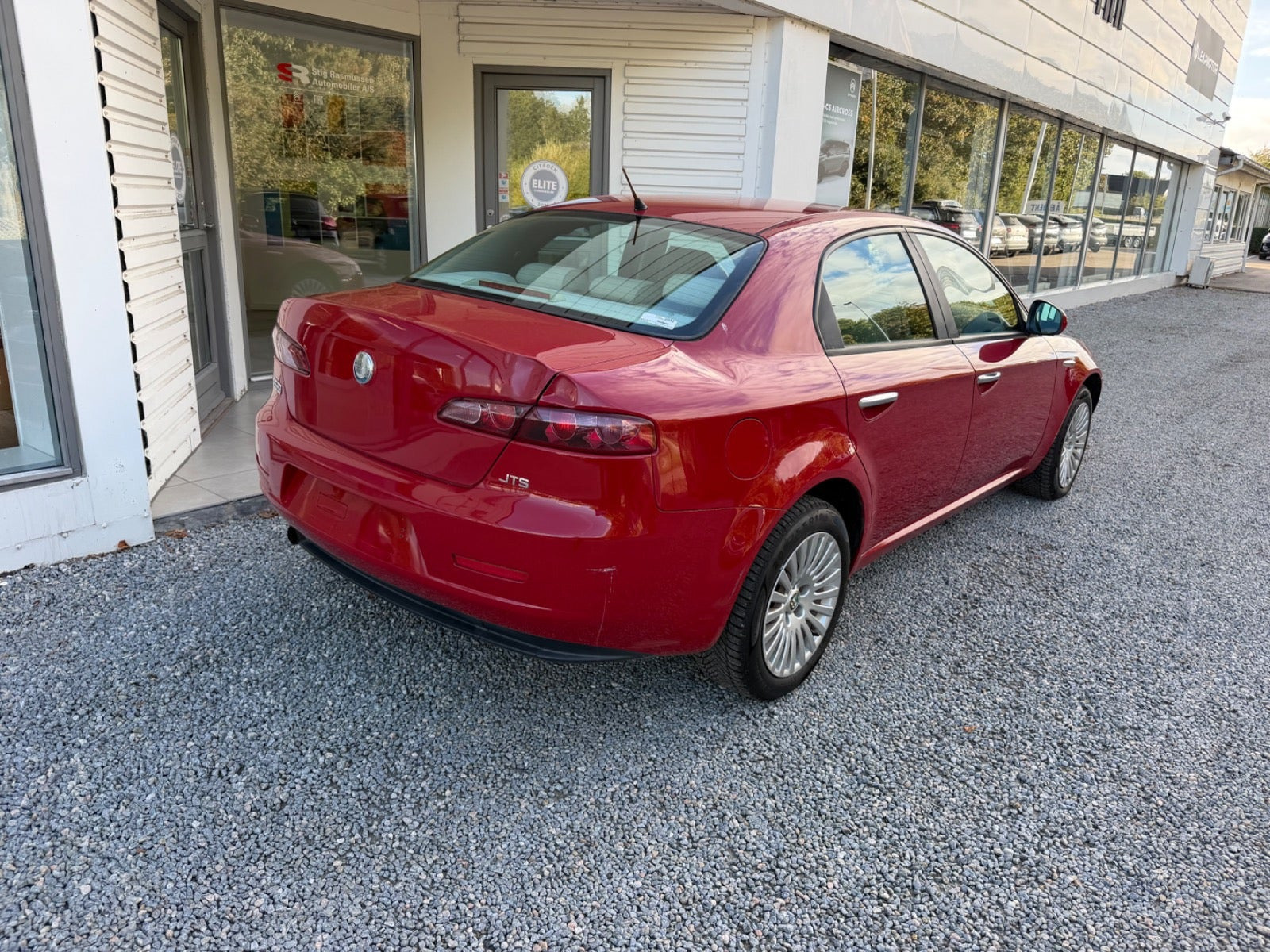 Rød Alfa Romeo 159 fra 2007