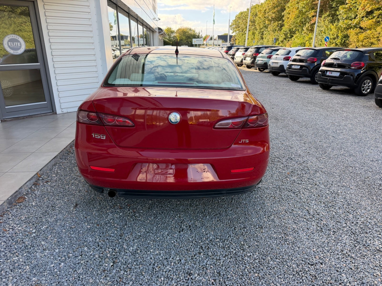 Rød Alfa Romeo 159 fra 2007