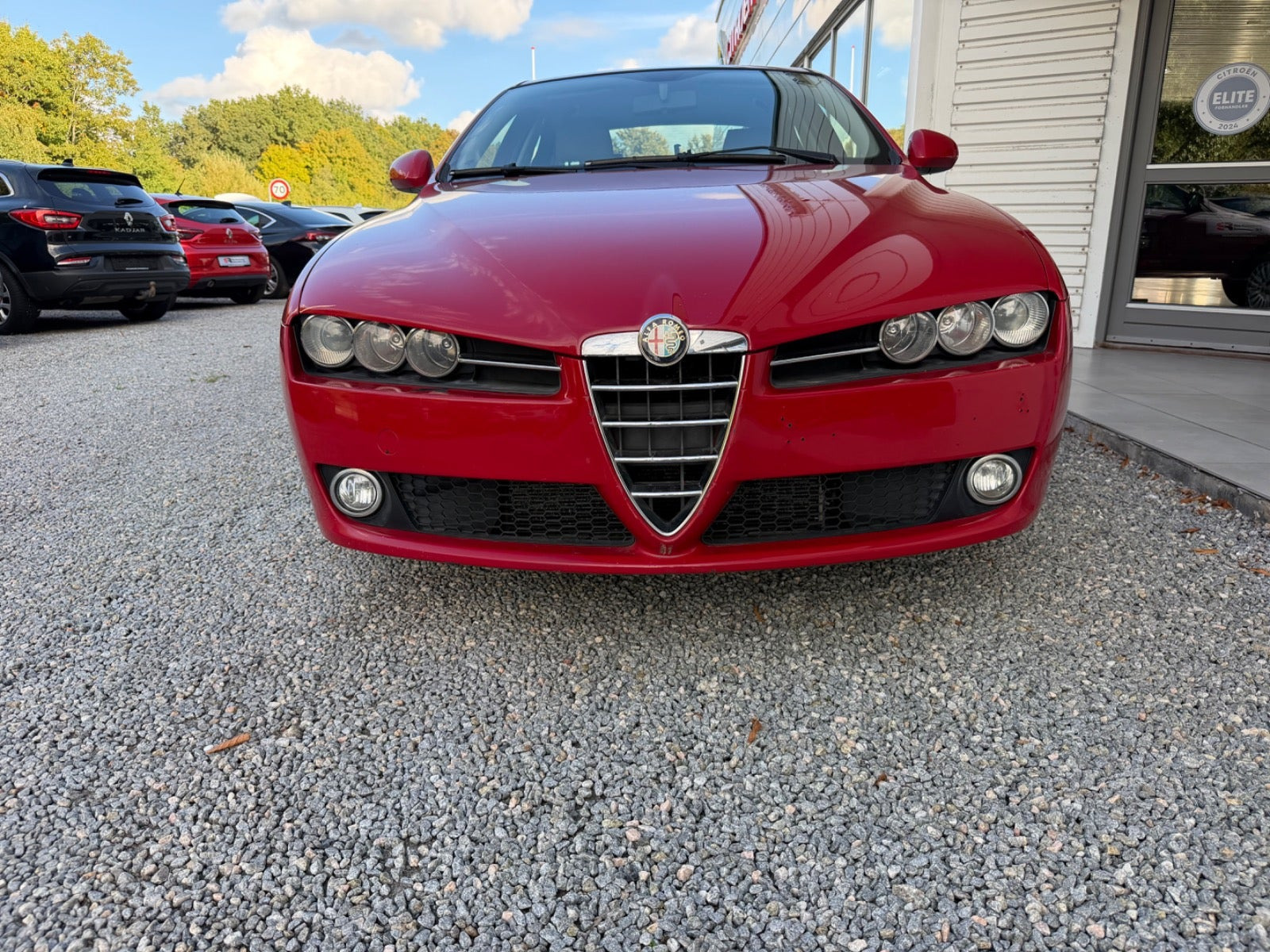 Rød Alfa Romeo 159 fra 2007