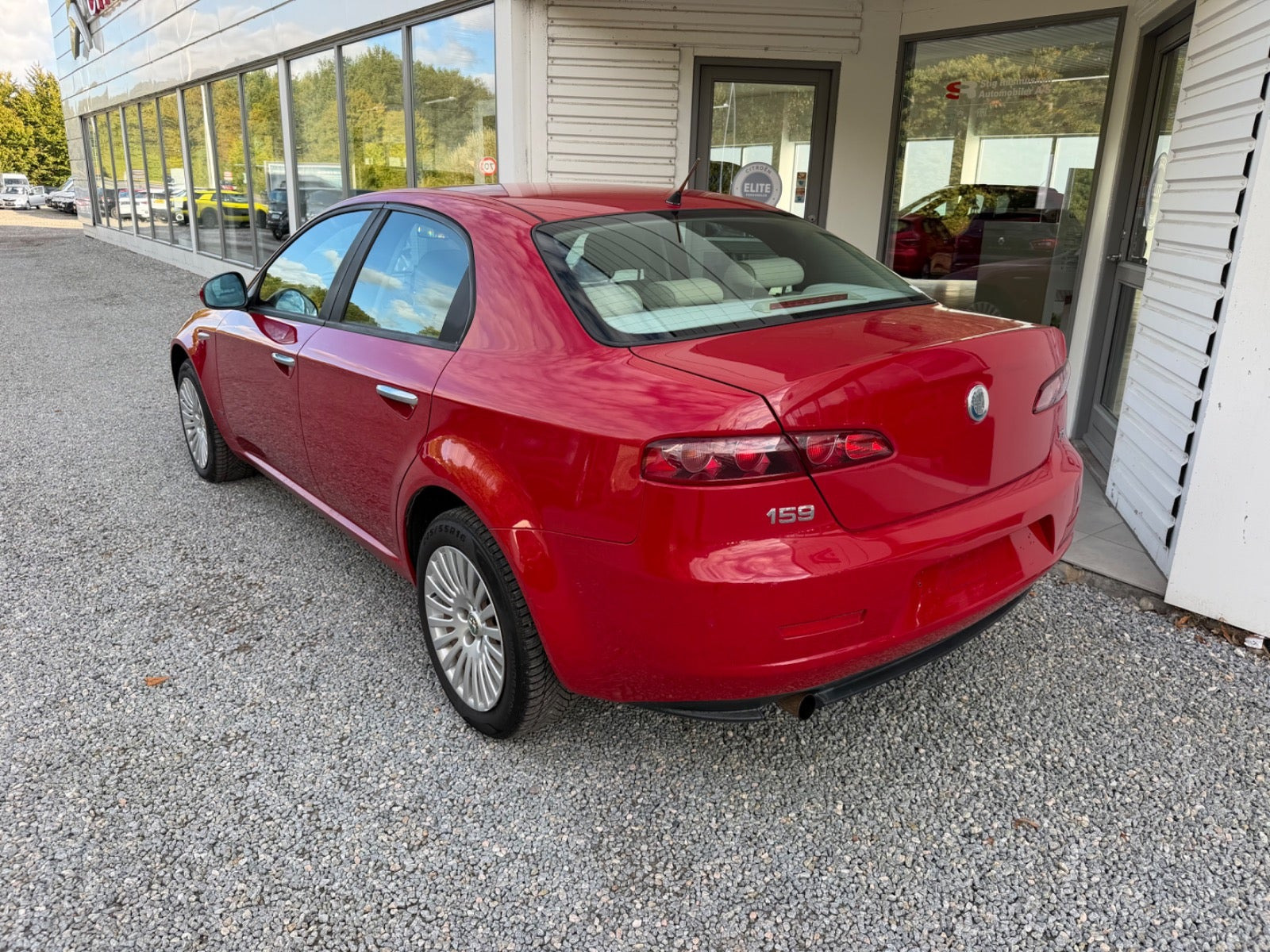 Rød Alfa Romeo 159 fra 2007
