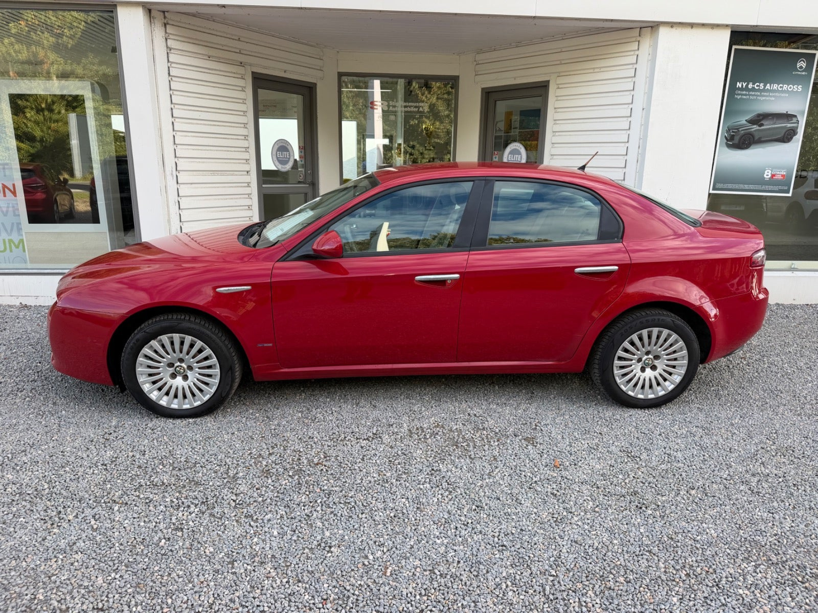 Rød Alfa Romeo 159 fra 2007