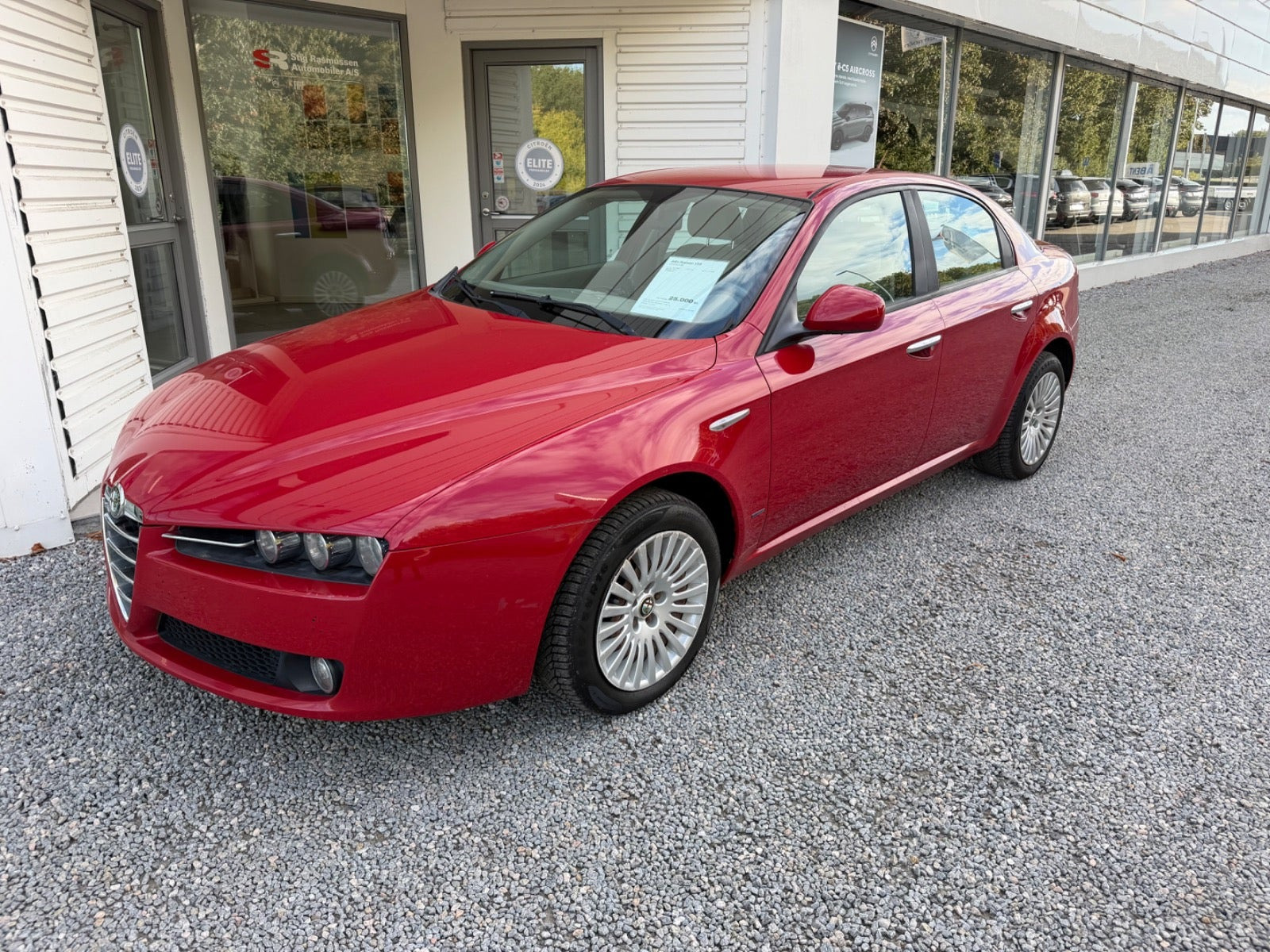 Rød Alfa Romeo 159 fra 2007