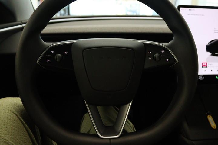 Sort Tesla Model 3 fra 2024