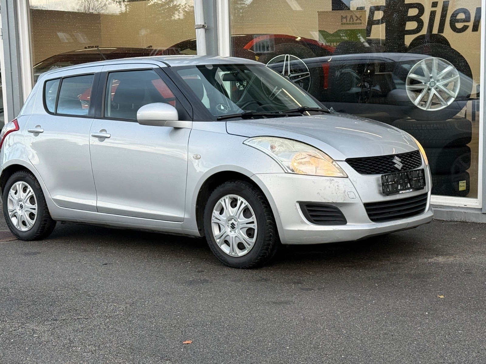 Sølv Suzuki Swift fra 2011
