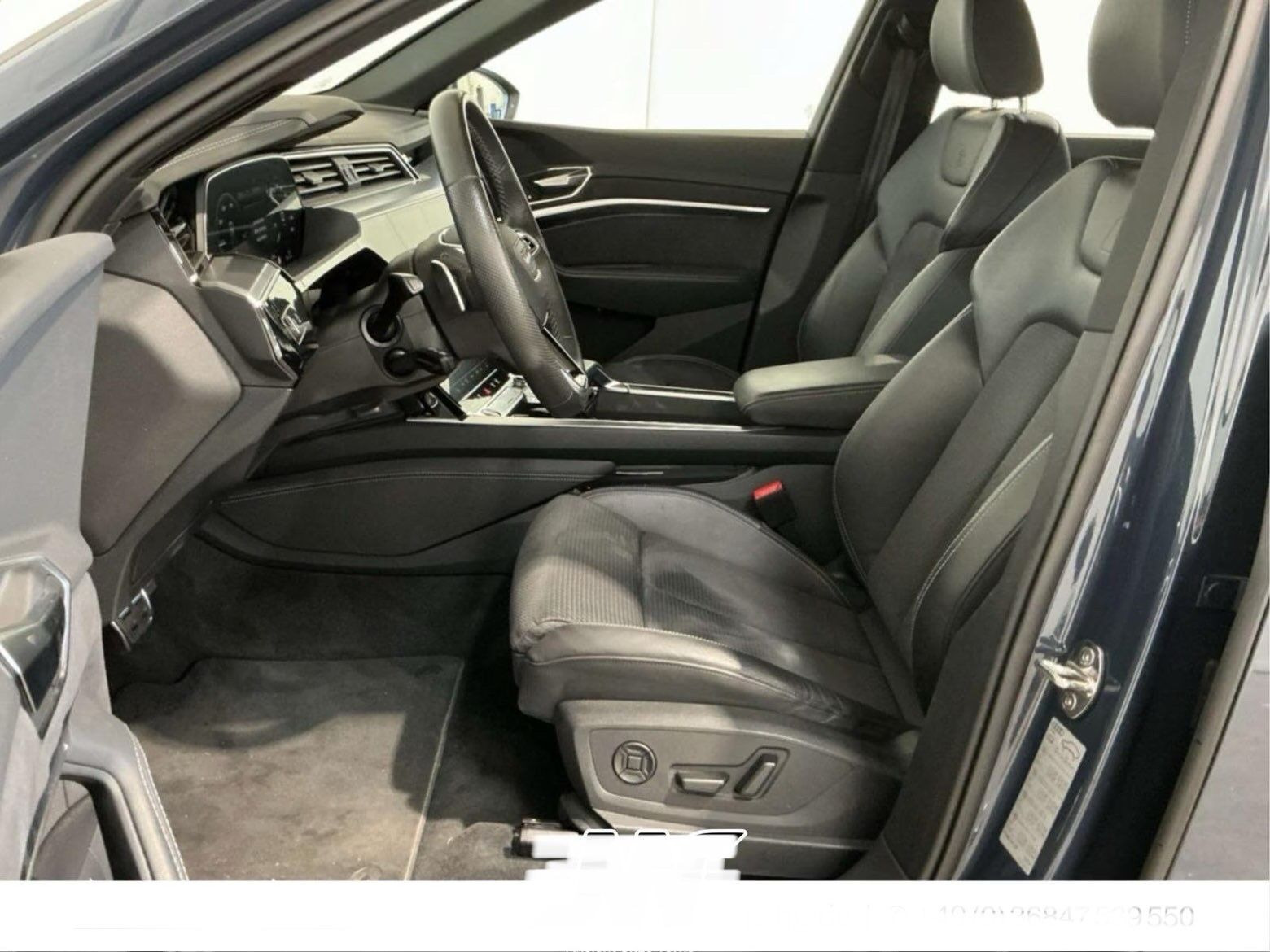 Grå Audi Q8 fra 2023
