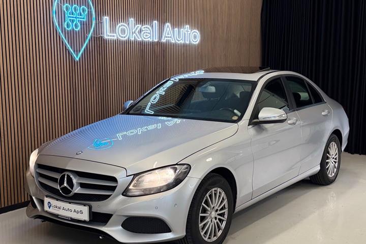 Sølv Mercedes C180 fra 2013