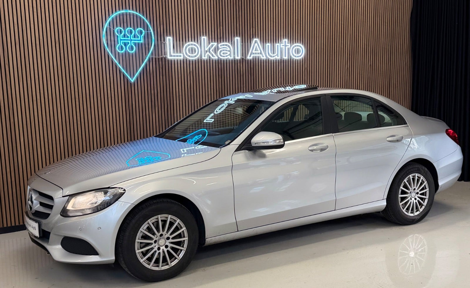 Sølv Mercedes C180 fra 2013
