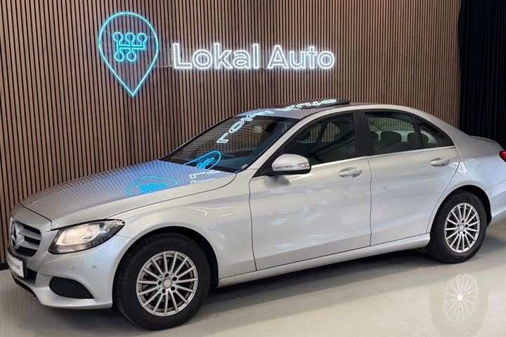 Sølv Mercedes C180 fra 2013