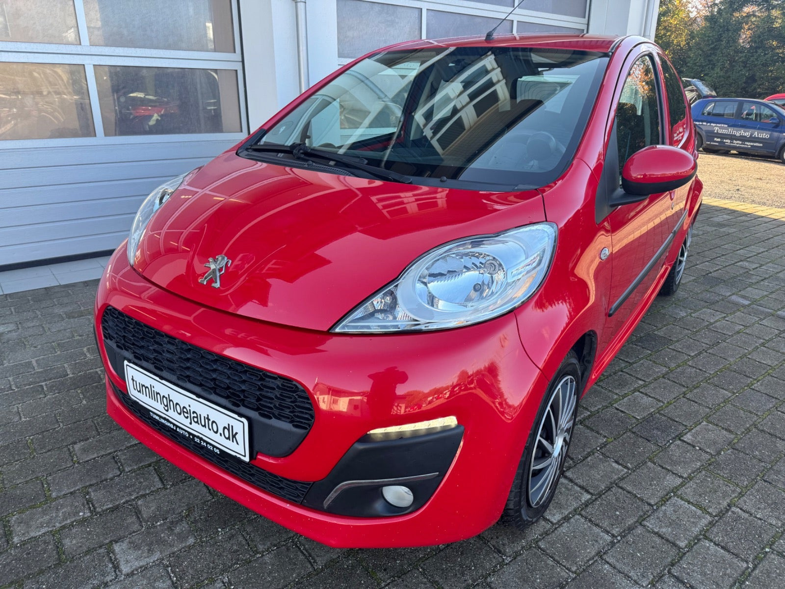 Rød Peugeot 107 fra 2013