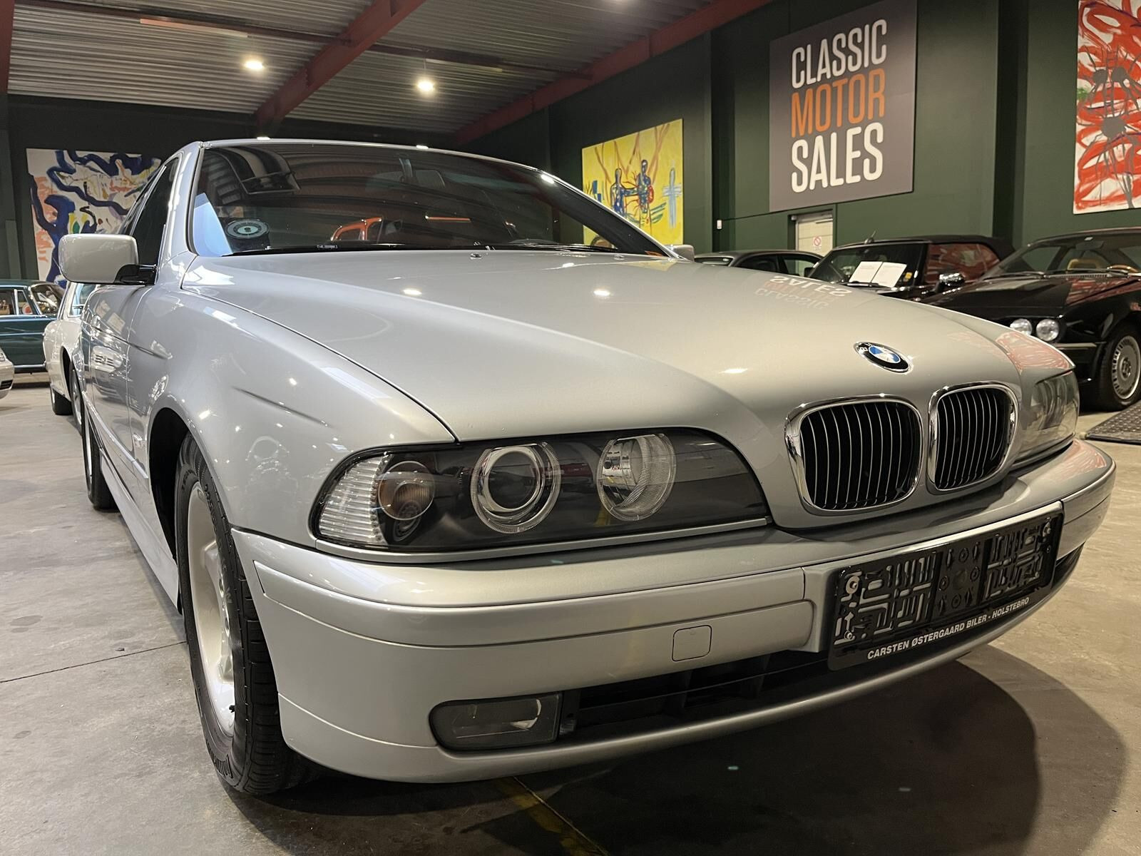 Sølv BMW 523i fra 1997