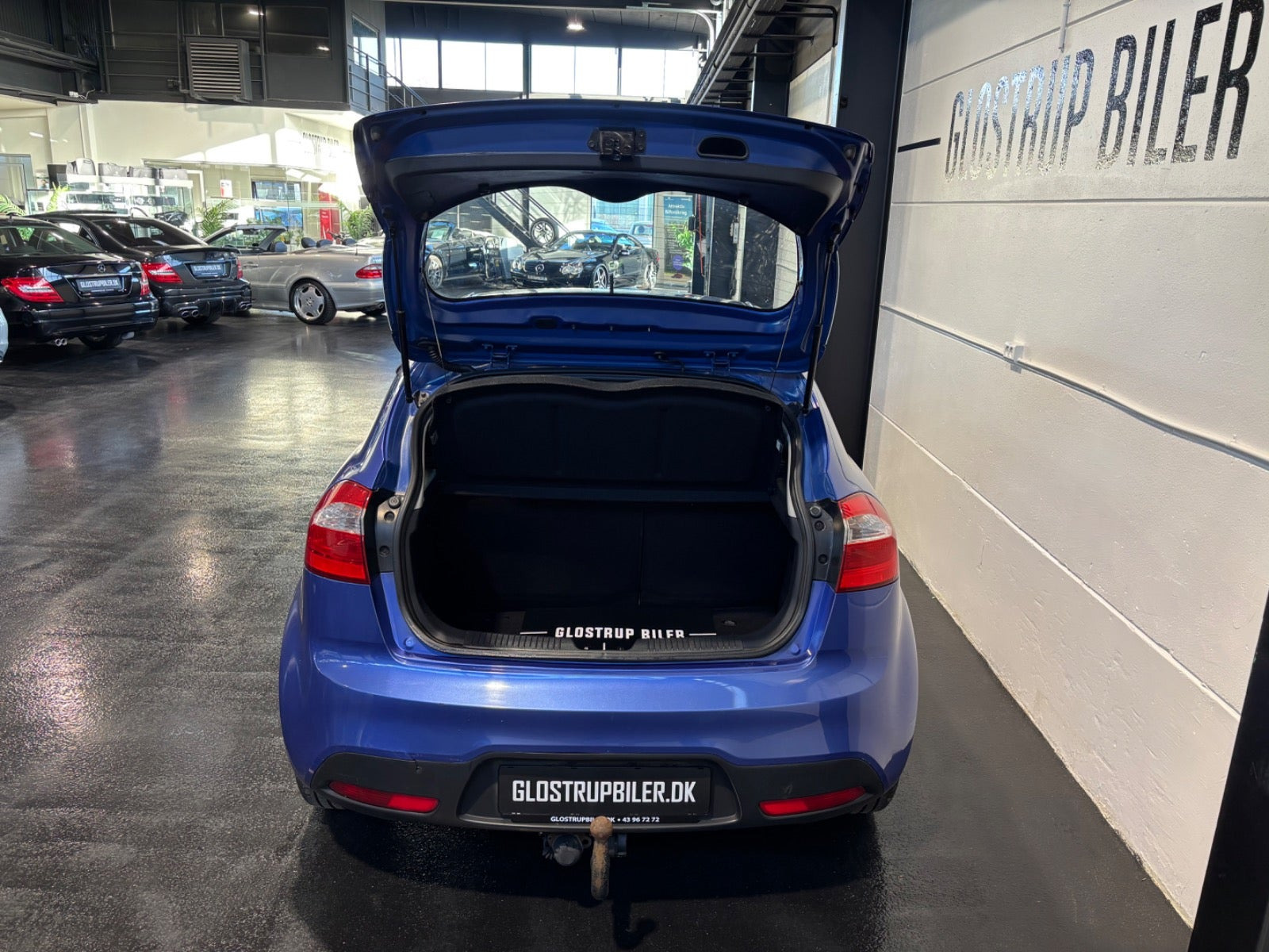 Blå Kia Rio fra 2013