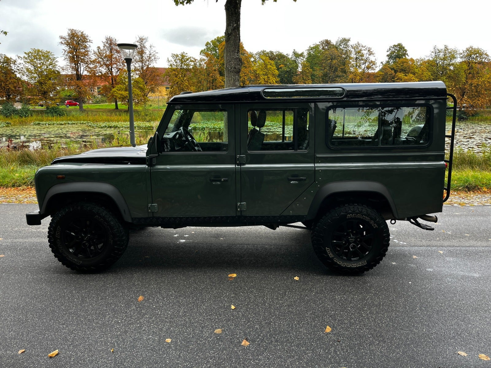 Grøn Land Rover Defender 110 fra 2013