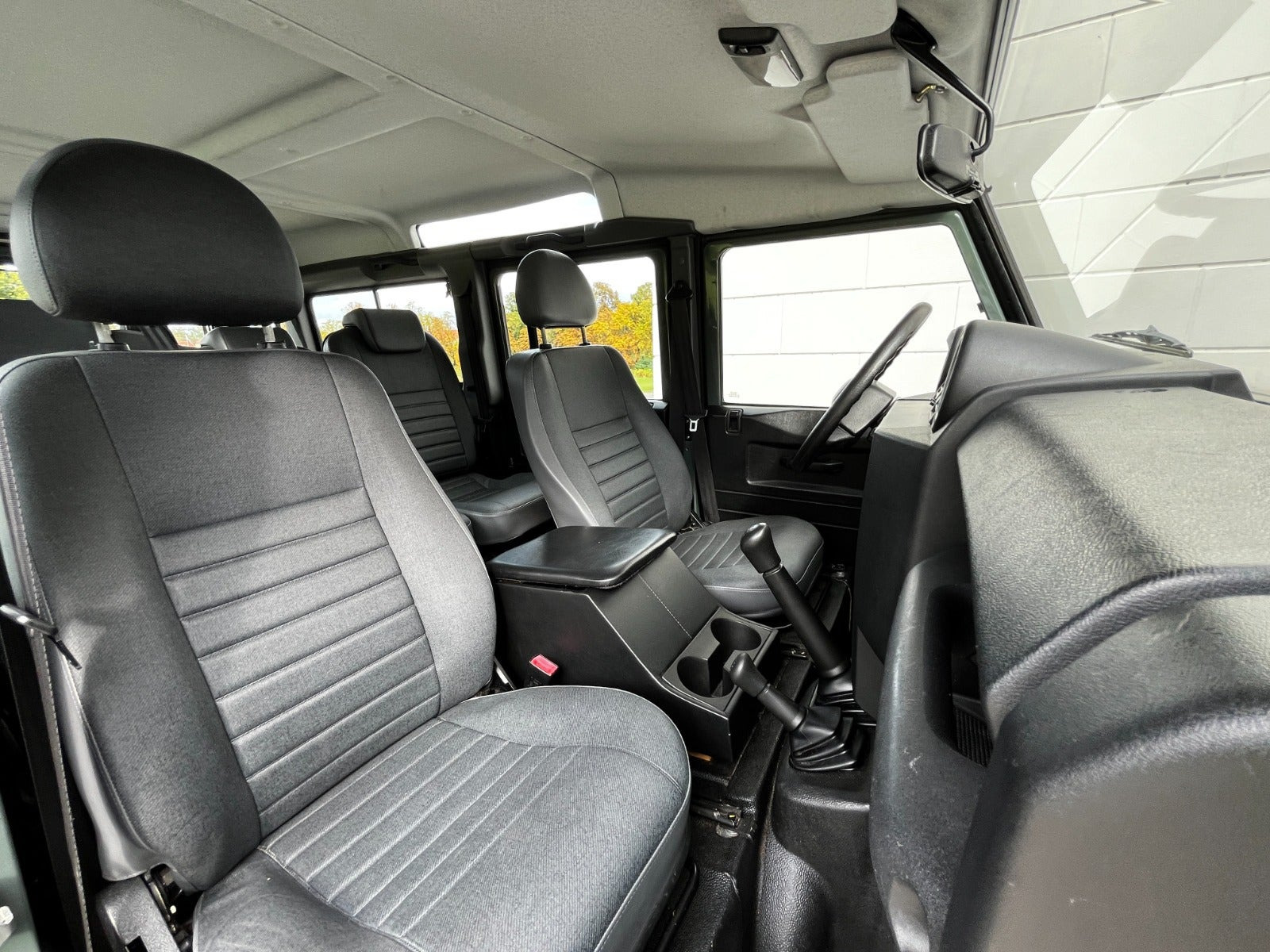Grøn Land Rover Defender 110 fra 2013