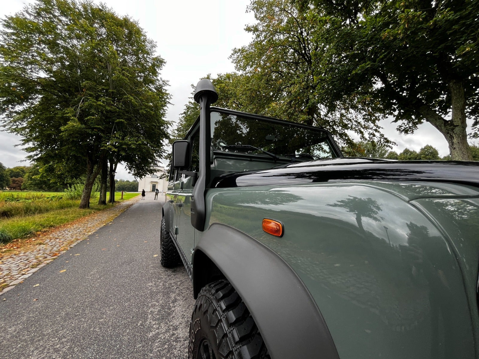 Grøn Land Rover Defender 110 fra 2013
