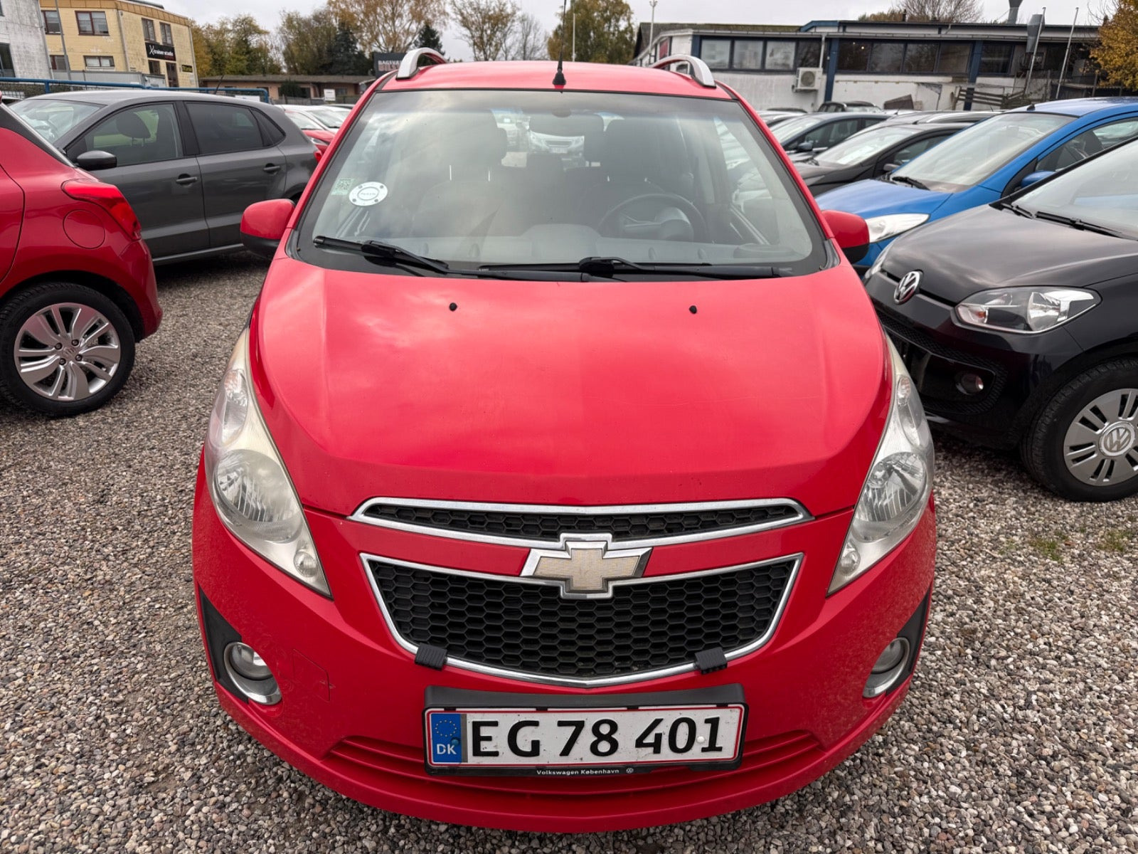 Rød Chevrolet Spark fra 2011